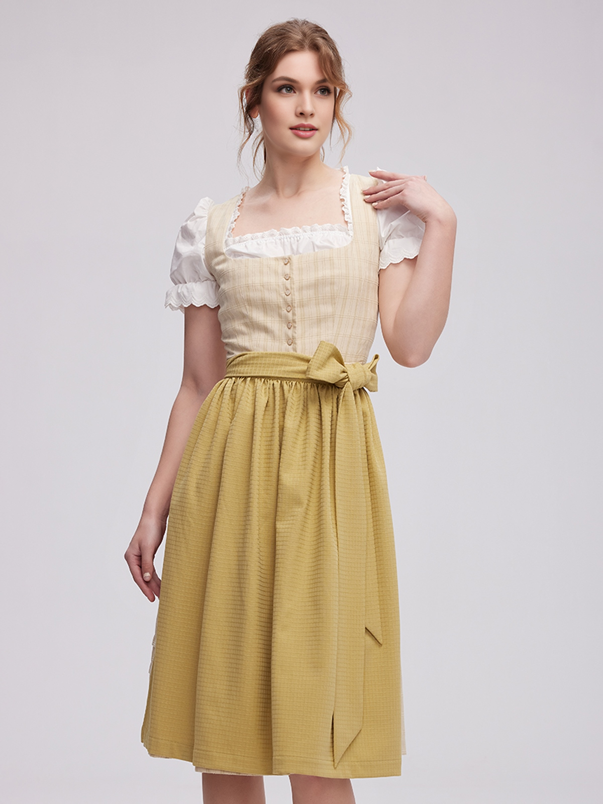 Tradition meets Modernität: Das Dirndl Rosálie in frischem Grün