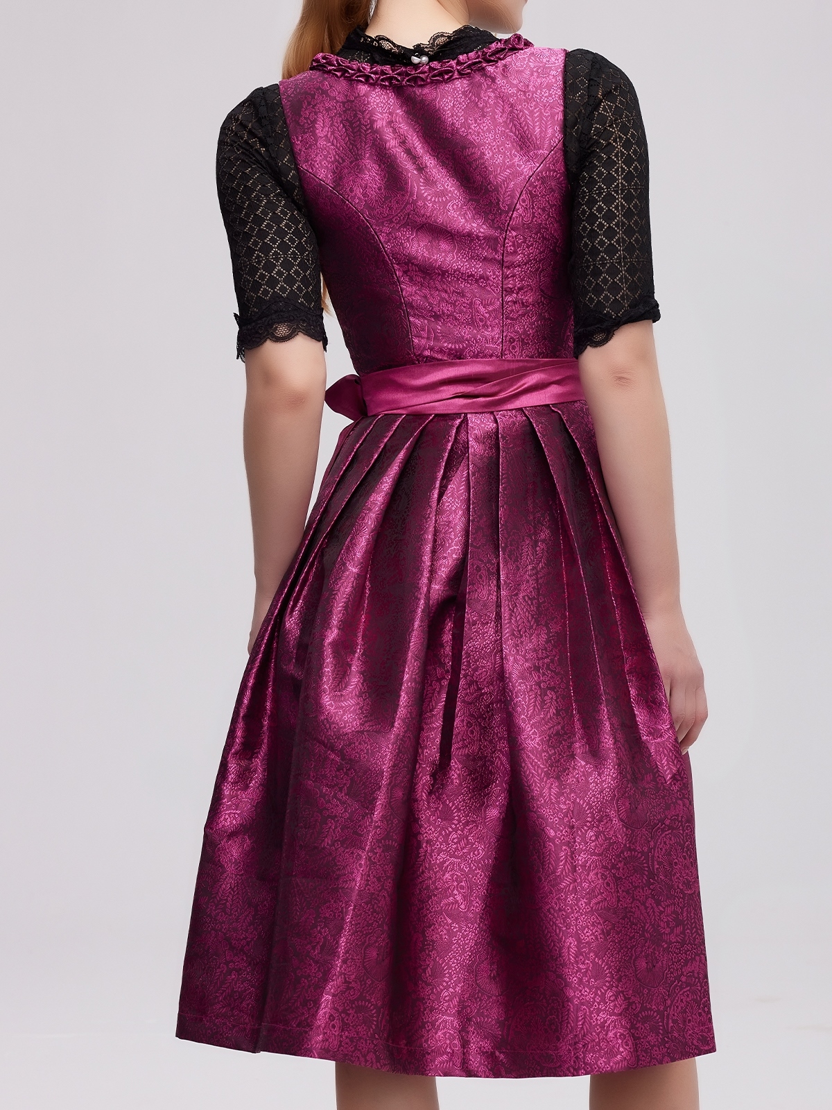 Rotes Dirndl mit pinker Schürze